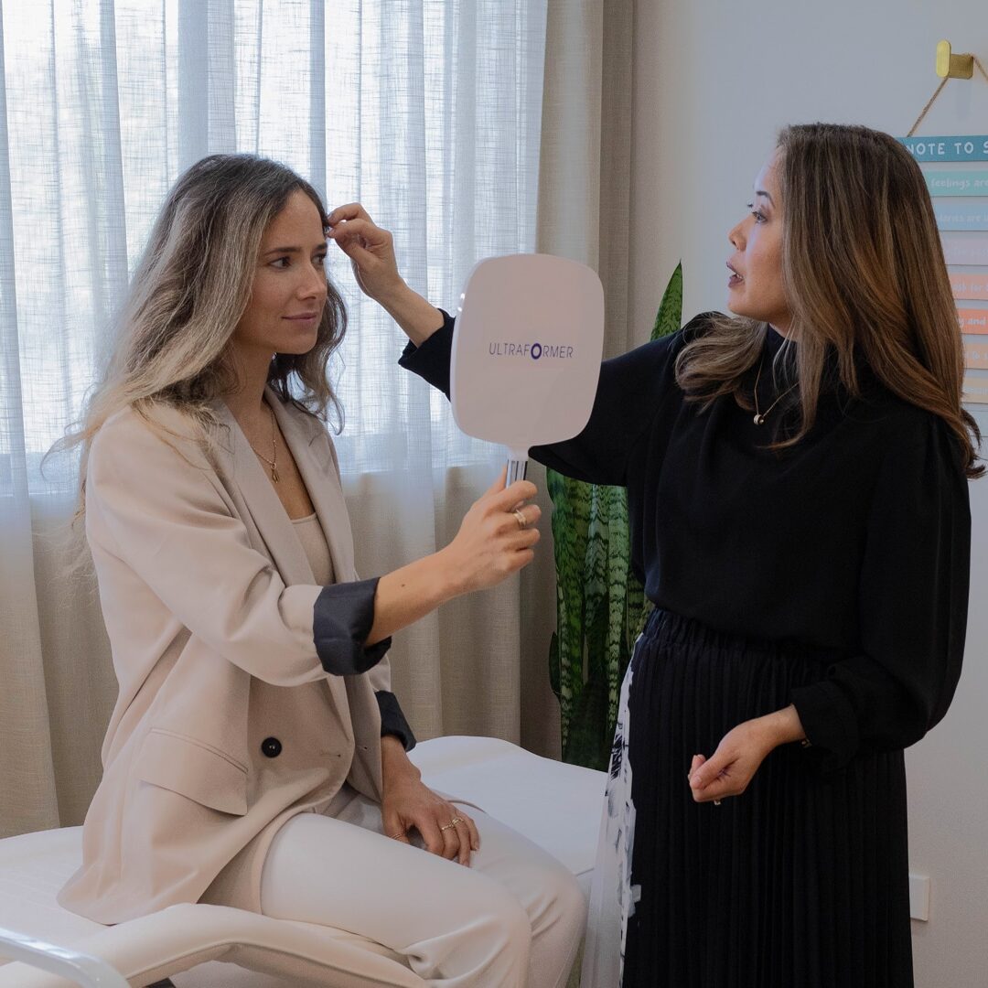 Client discussing hair concerns with a Jay’s Medispa practitioner during a personalised hair restoration consultation.